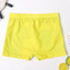 Yellow Dinosaur Trunks